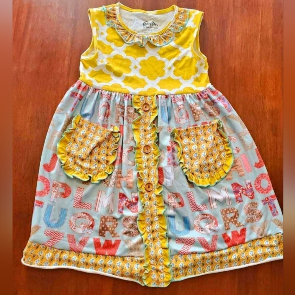 Alphabet Pattern Dress. Size 7-8.